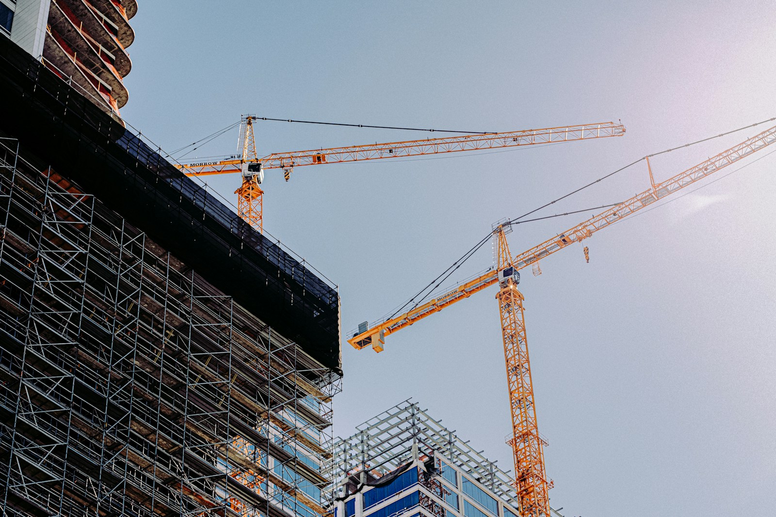 Construction crane next to a building under development